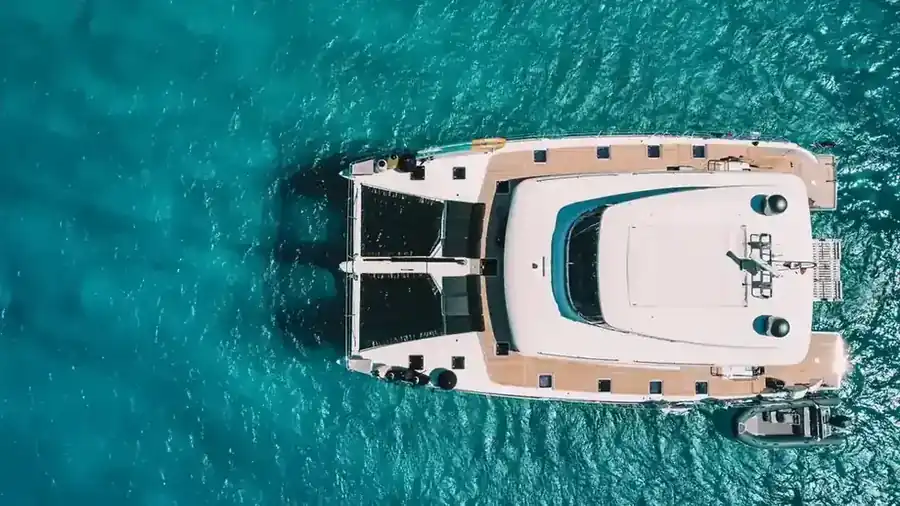 Overhead view of a Lagoon catamaran at anchor